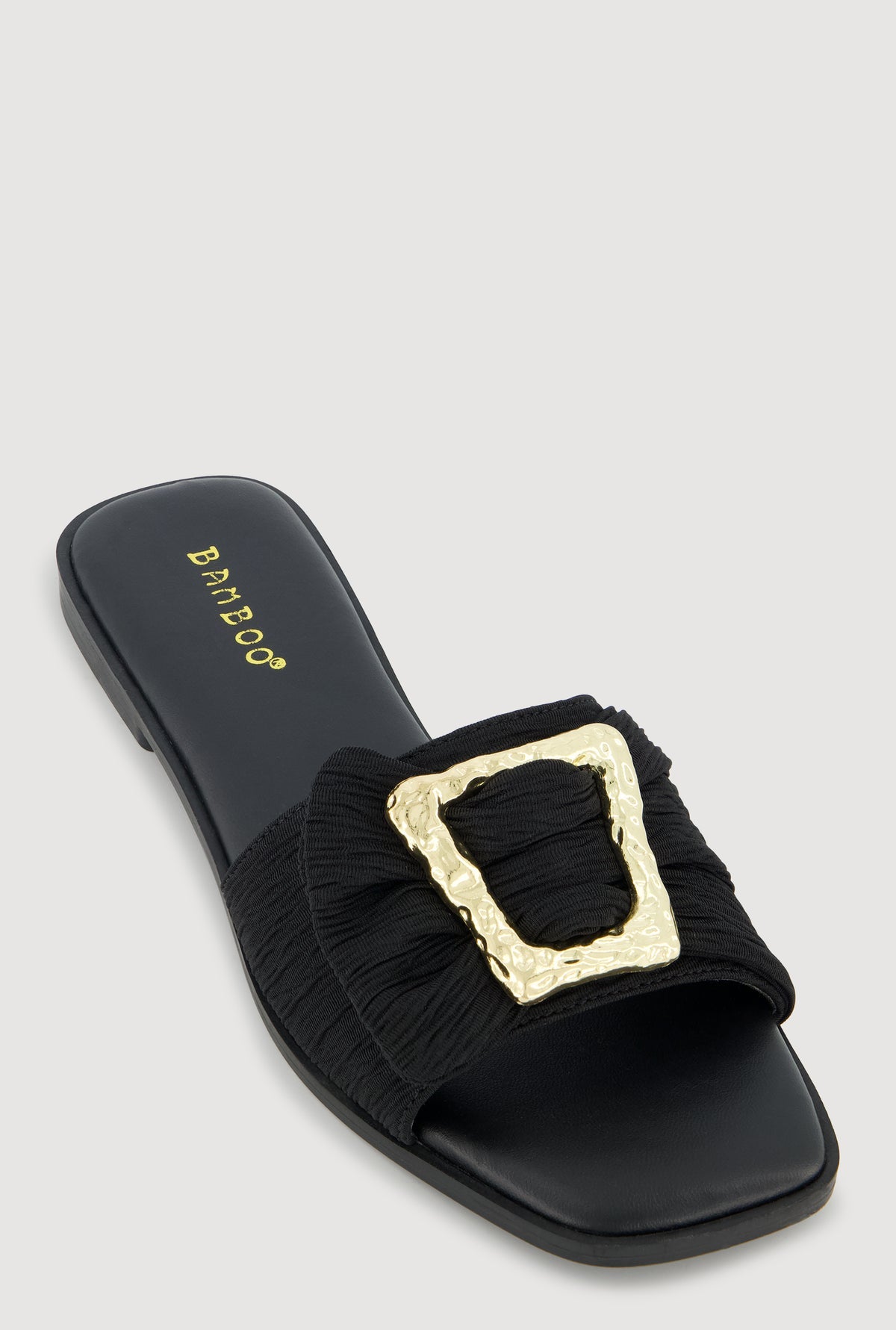 Gold buckle black slipper