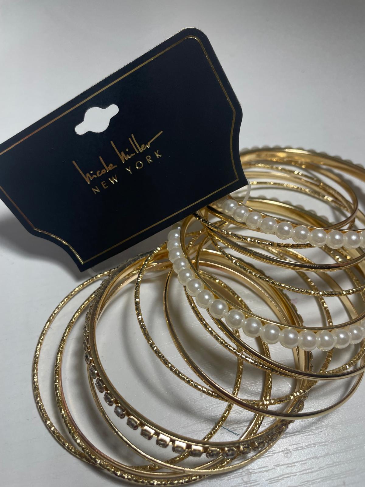 Gold, pearls and stones bangles set