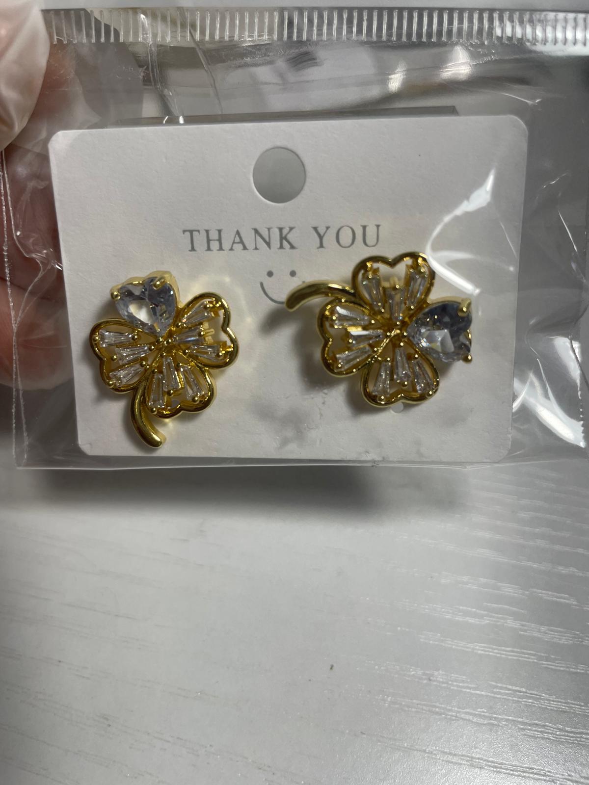 Gold and clear crystal clover necklace and earrings
