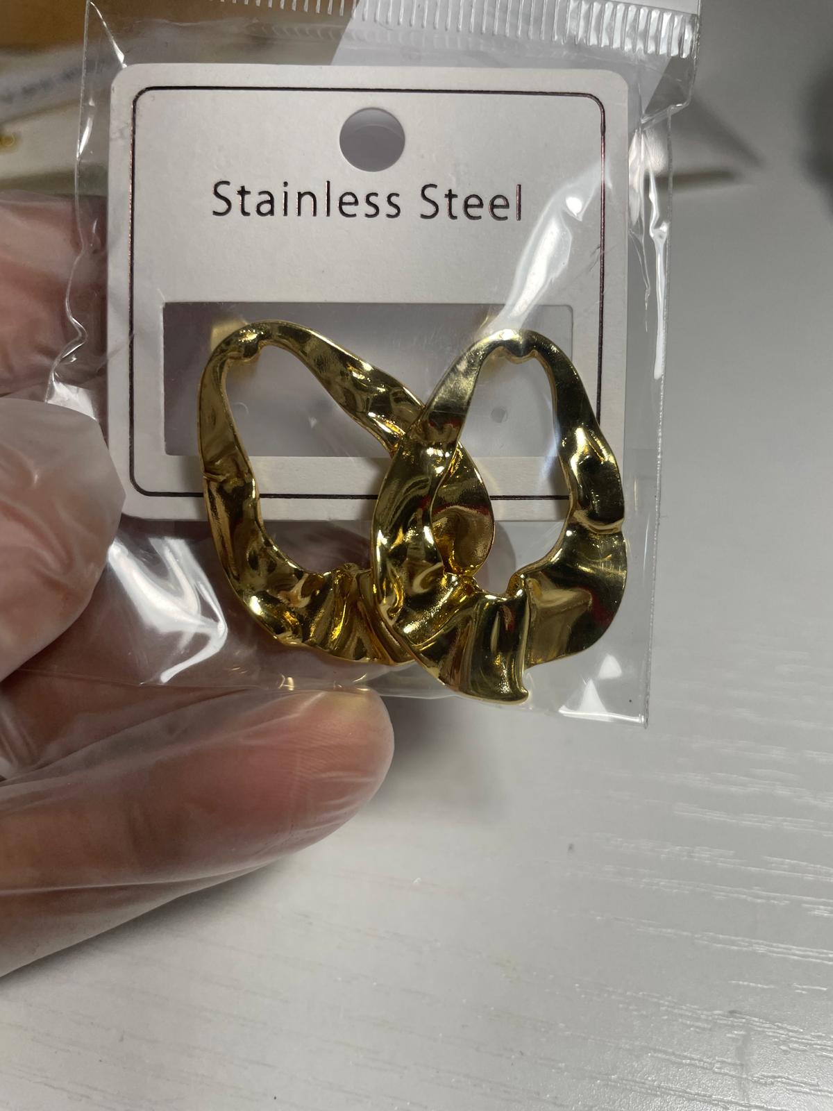 Gold chunky rumpled hoop earring