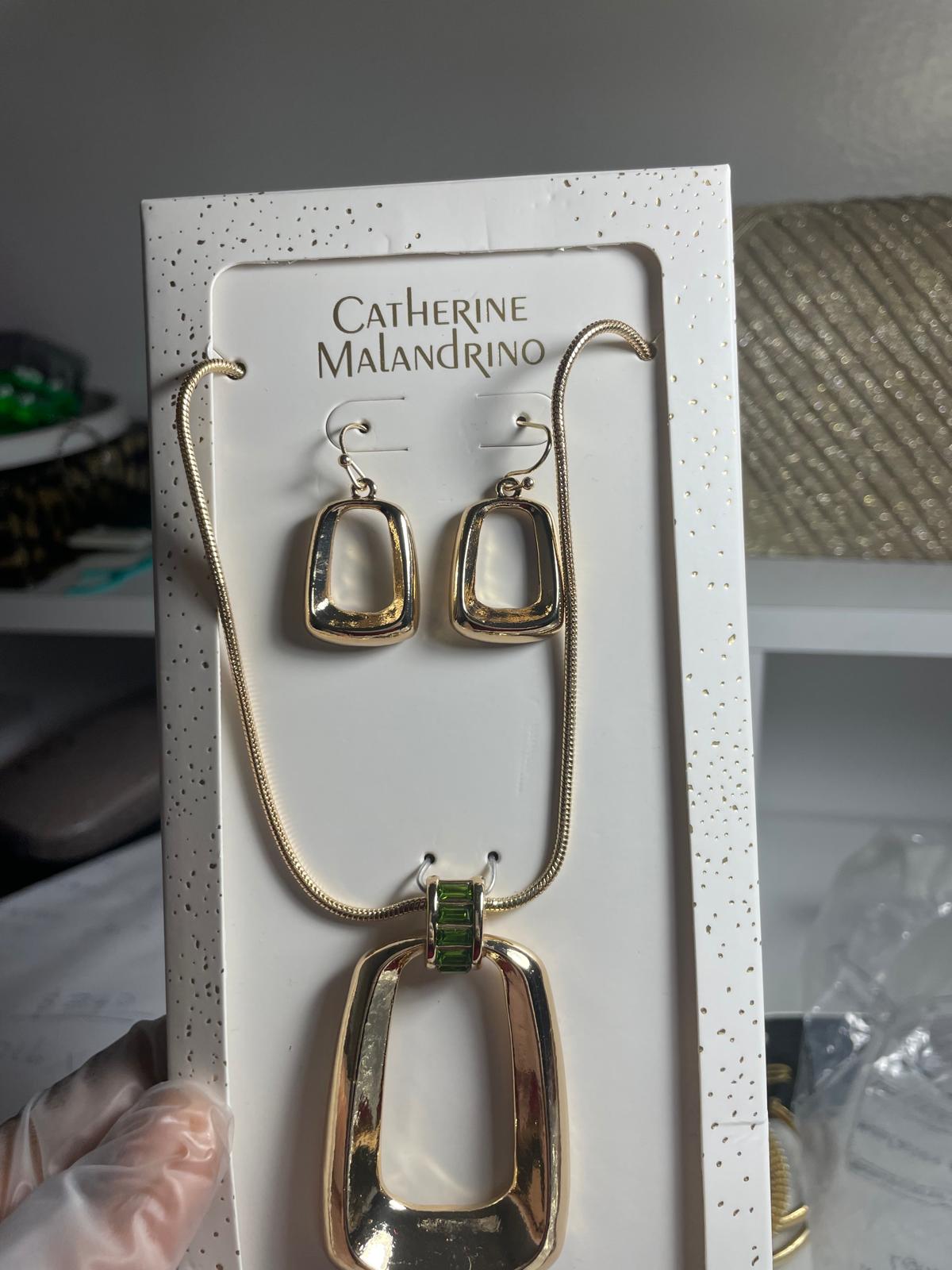 Gold spherical necklace and earring