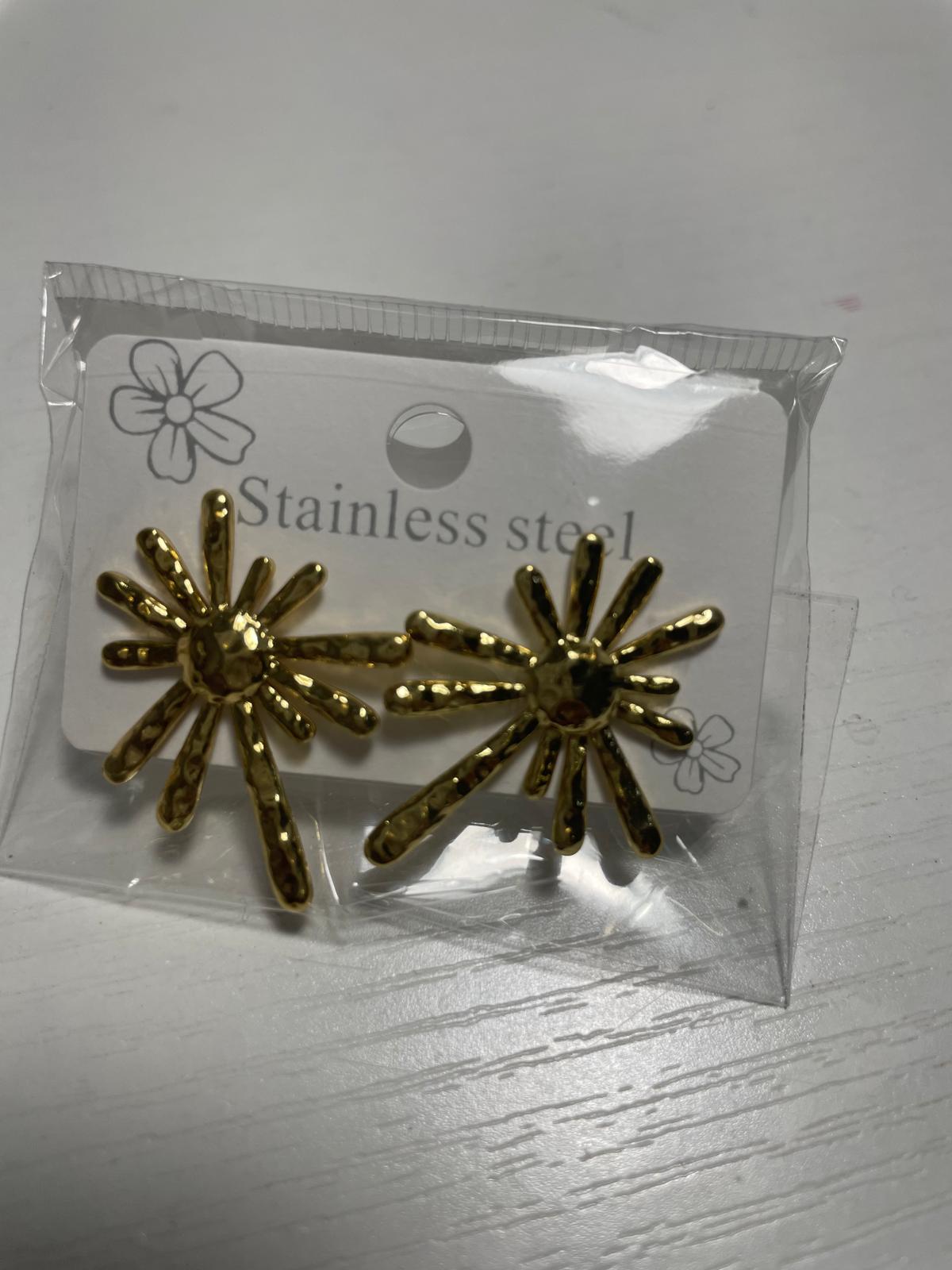 Gold sun-shaped earrings