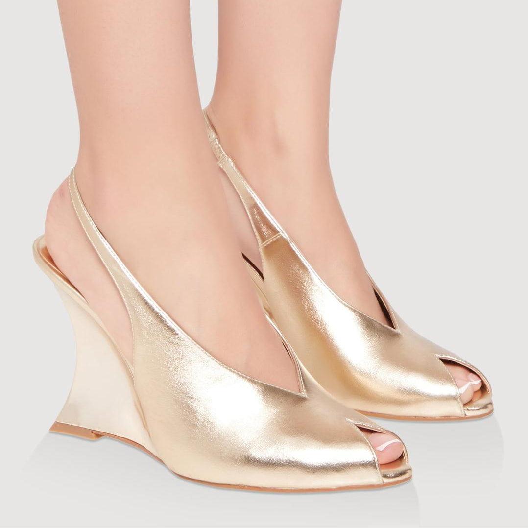 Gold leather curved slingback heels