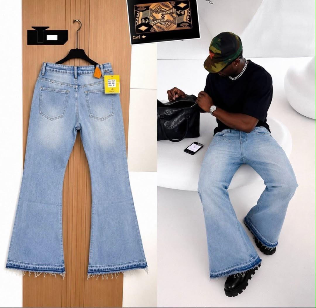 Light blue wide flare jeans with rhinestone studs - hanger and styled on model