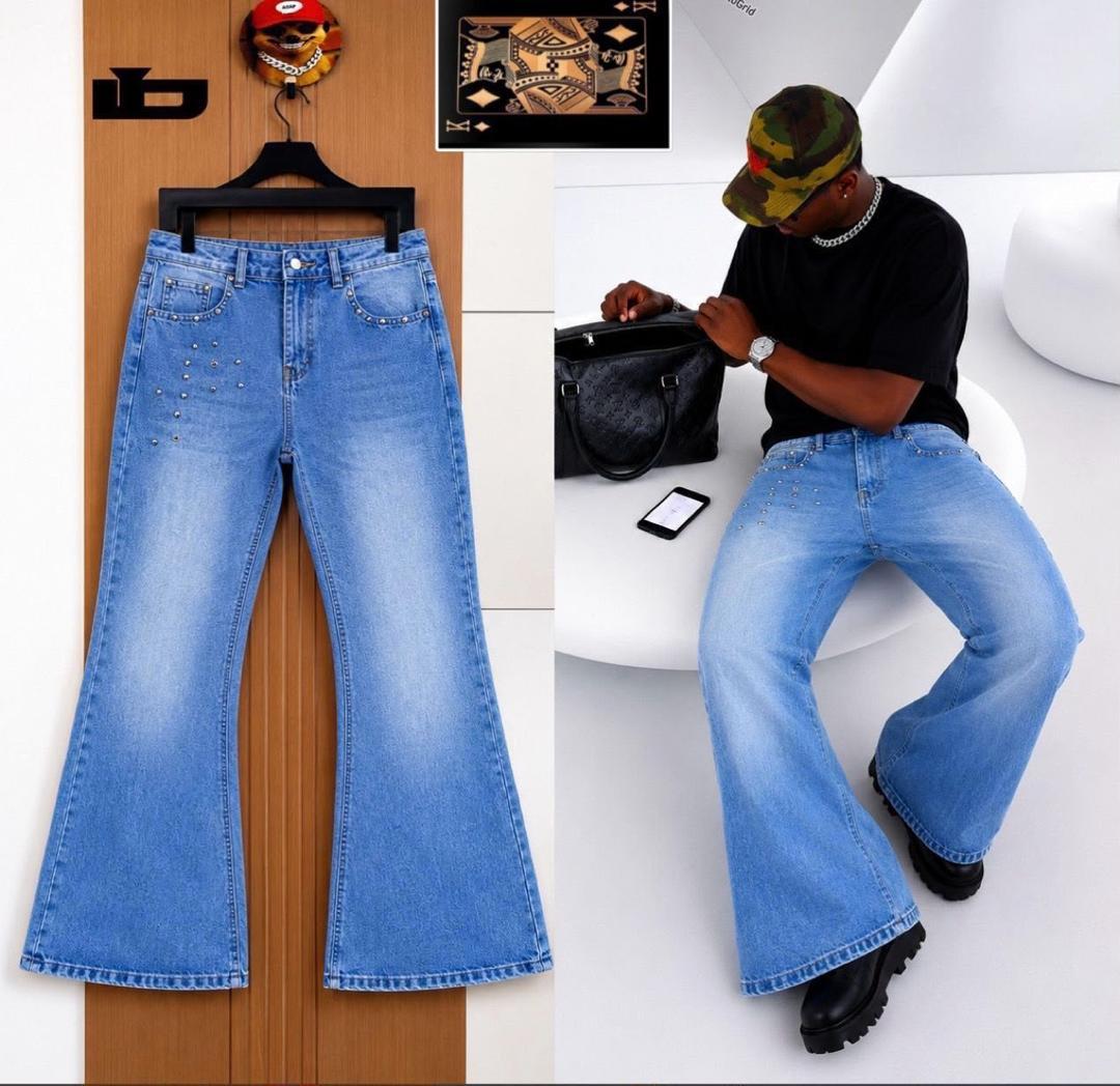 Dark grey distressed flare jeans with D-ring closures - front view