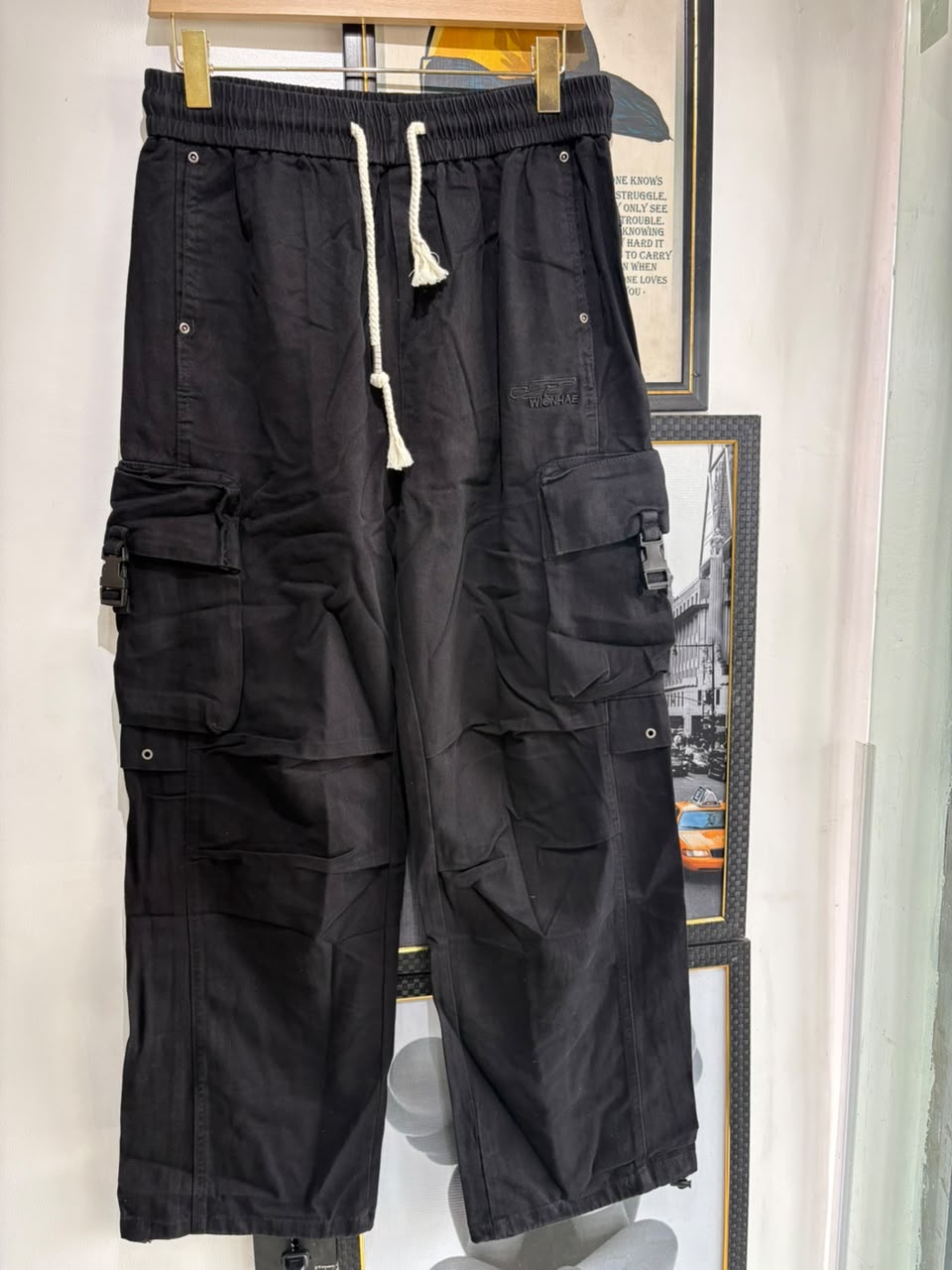 Black tactical cargo pants - front view