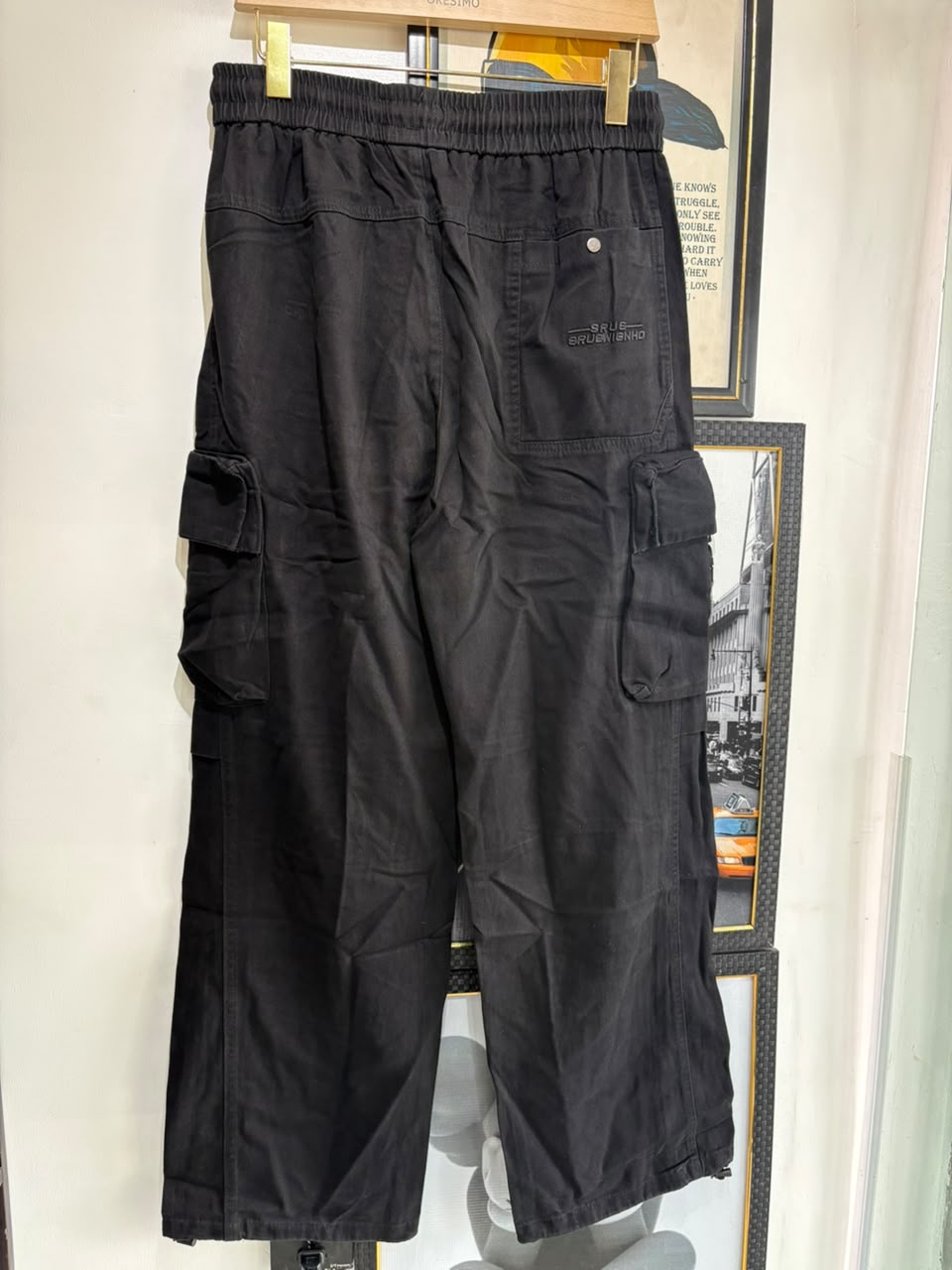 Black tactical cargo pants - back view