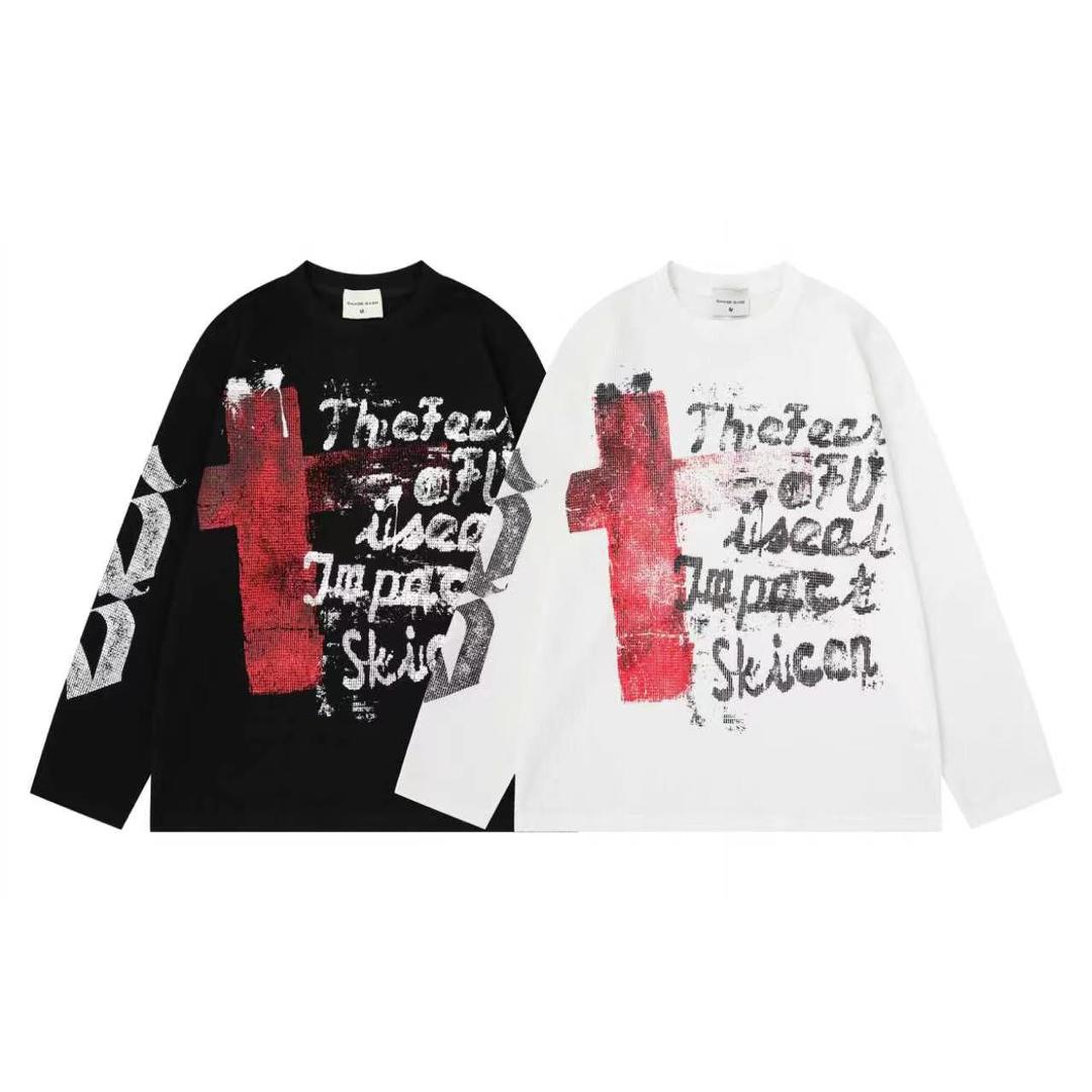 TheFear cross graphic long-sleeve tee - black and white side by side flat lay