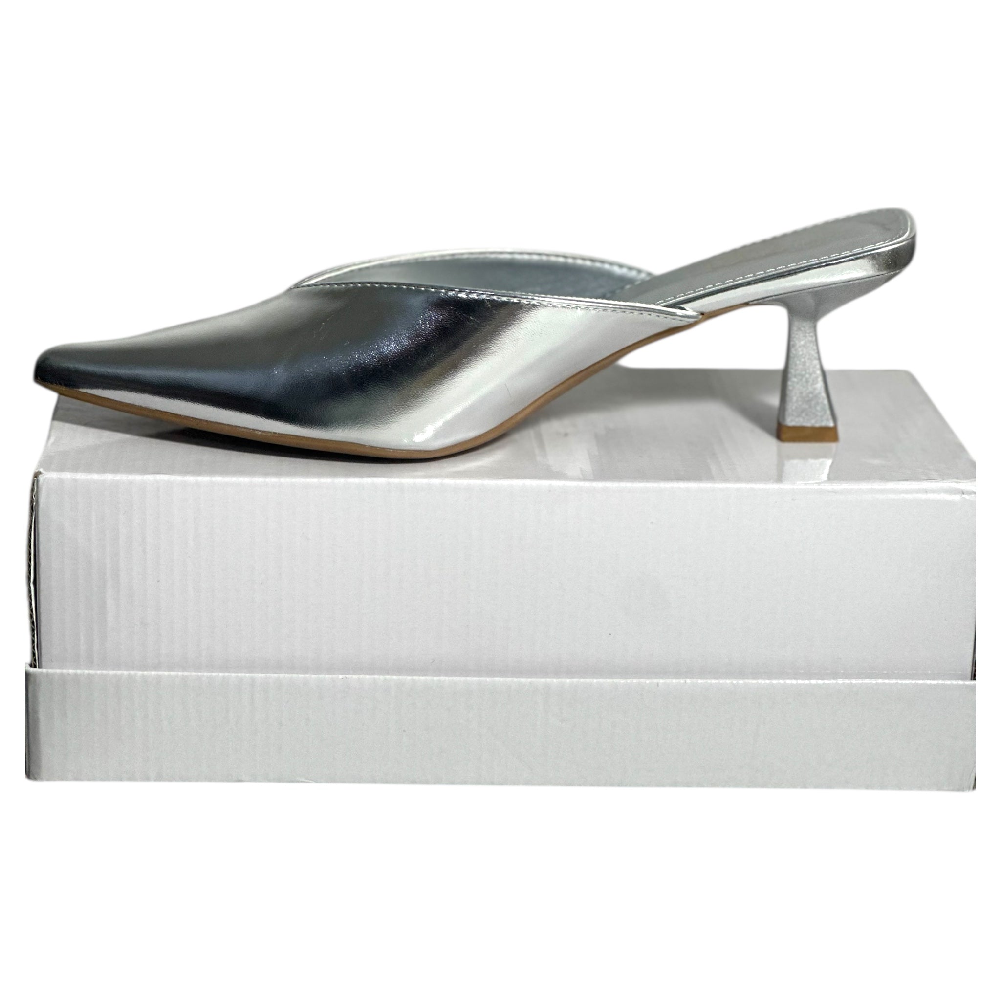 Silver kitten-heeled shoe