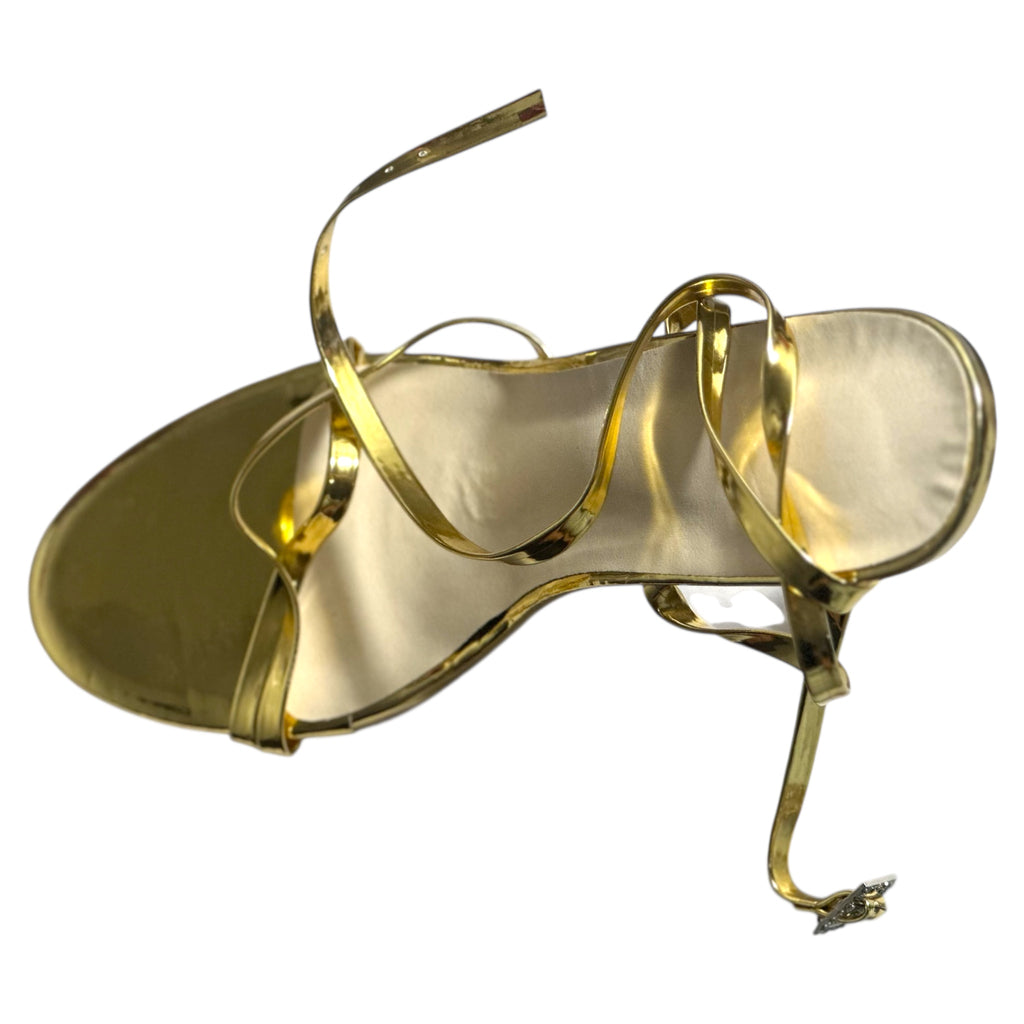 Gold high-heeled strap shoe