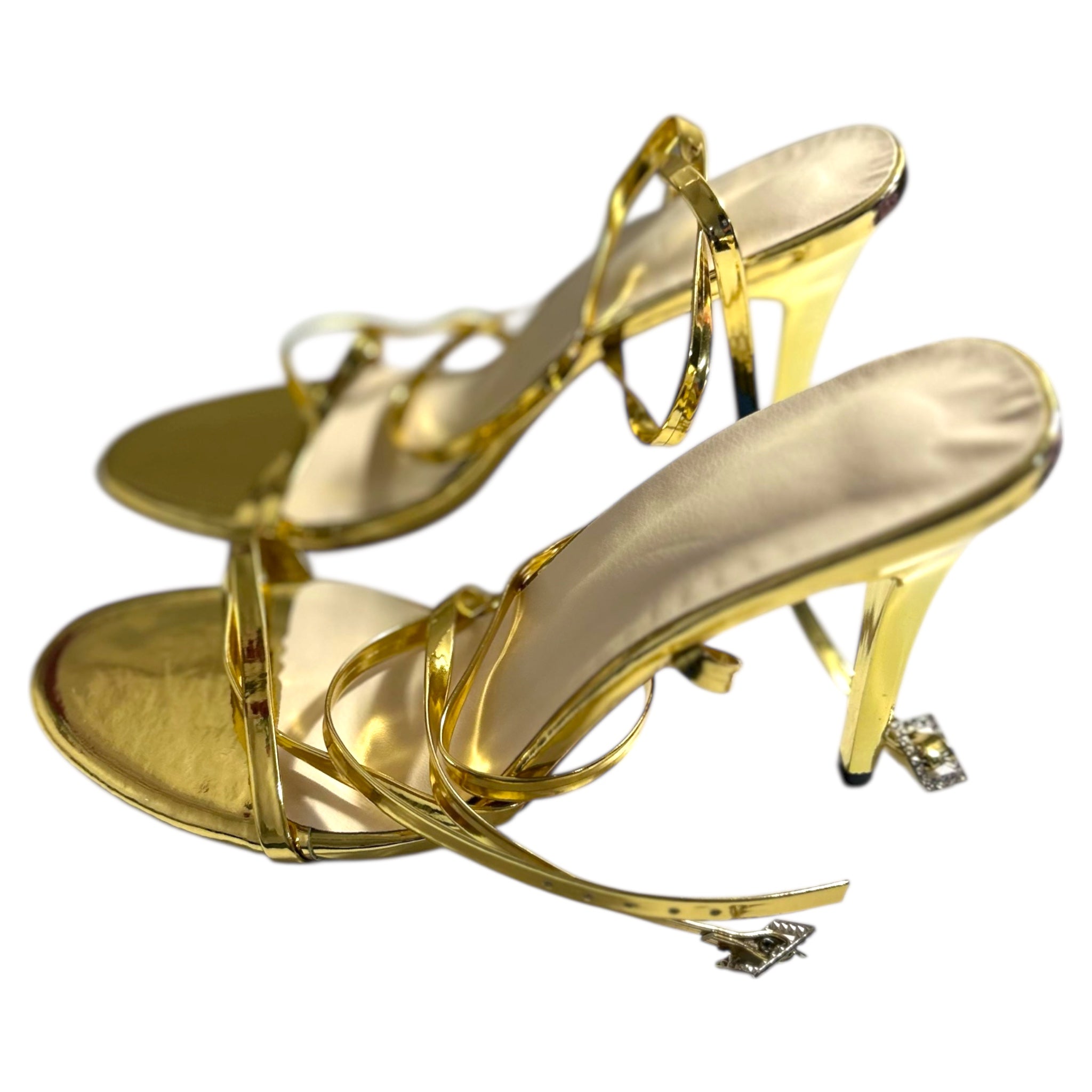 Gold high-heeled strap shoe