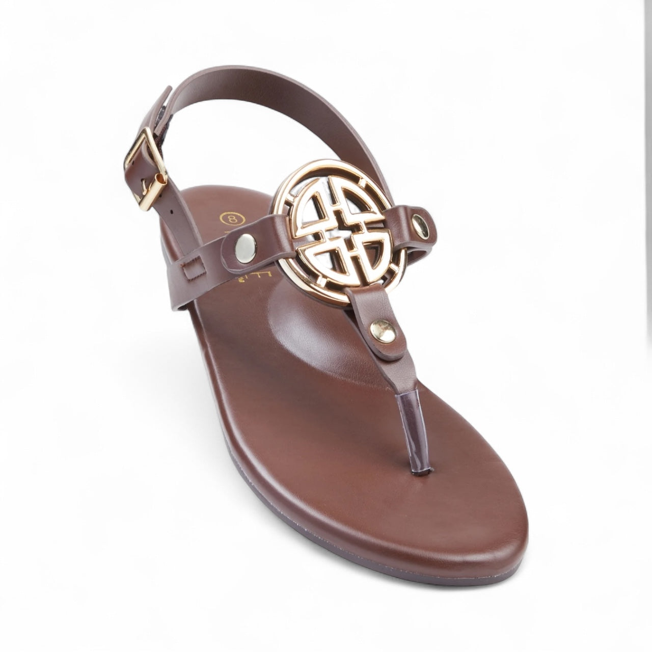 Brown sandal with a gold geometric design