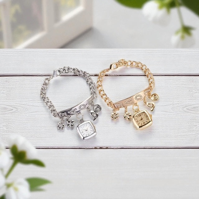 Two heart-shaped bracelet watches in gold and silver