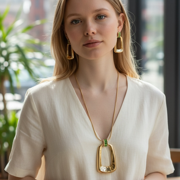 Gold spherical necklace and earring